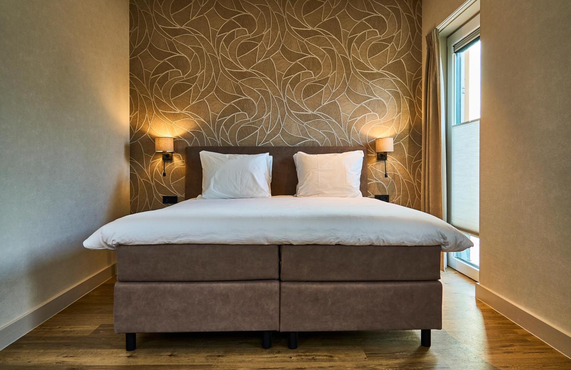 Eilandhotel Texel De Cocksdorp  Exterior foto A boxspring bed