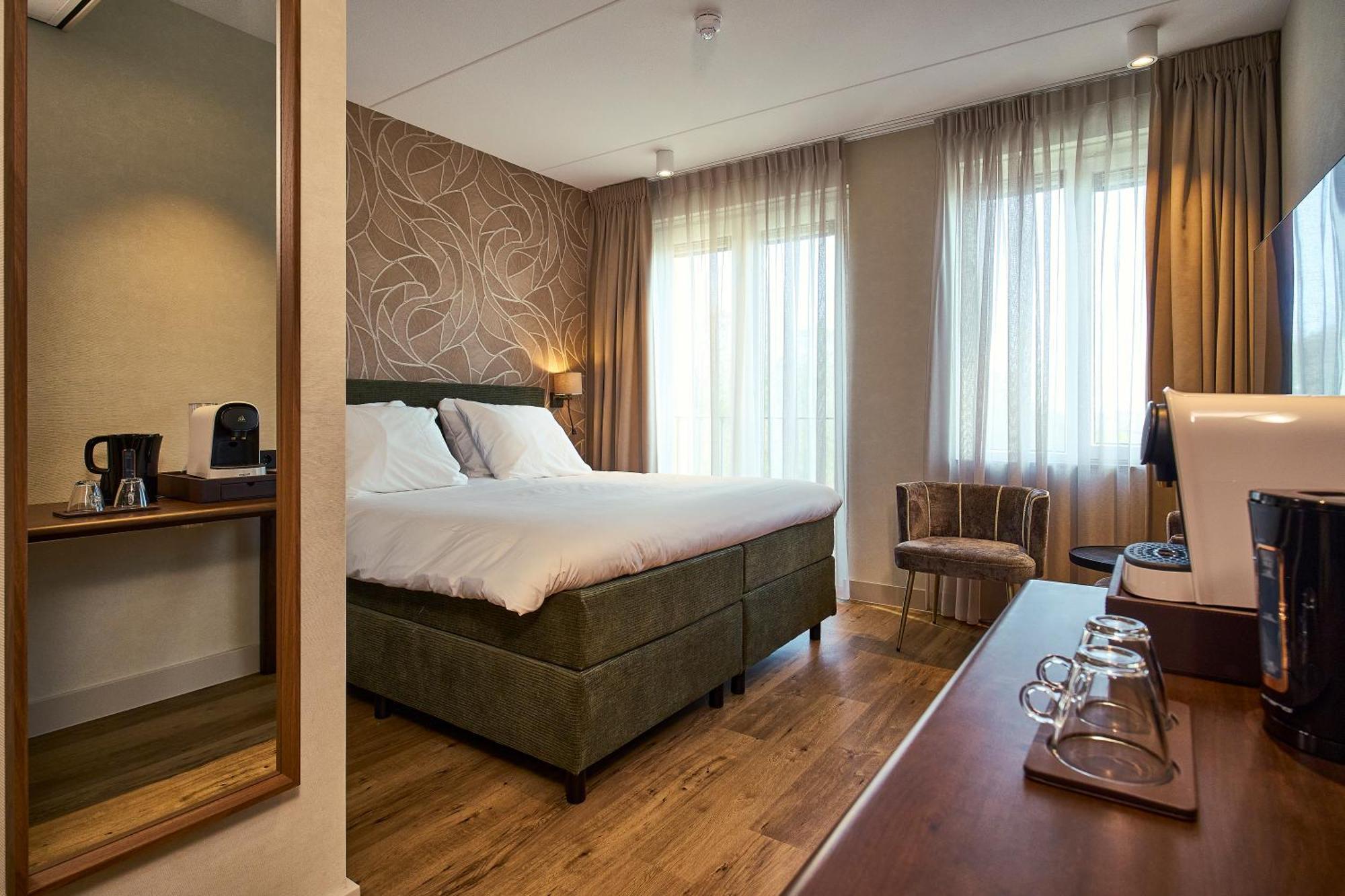 Eilandhotel Texel De Cocksdorp  Exterior foto A room at the hotel